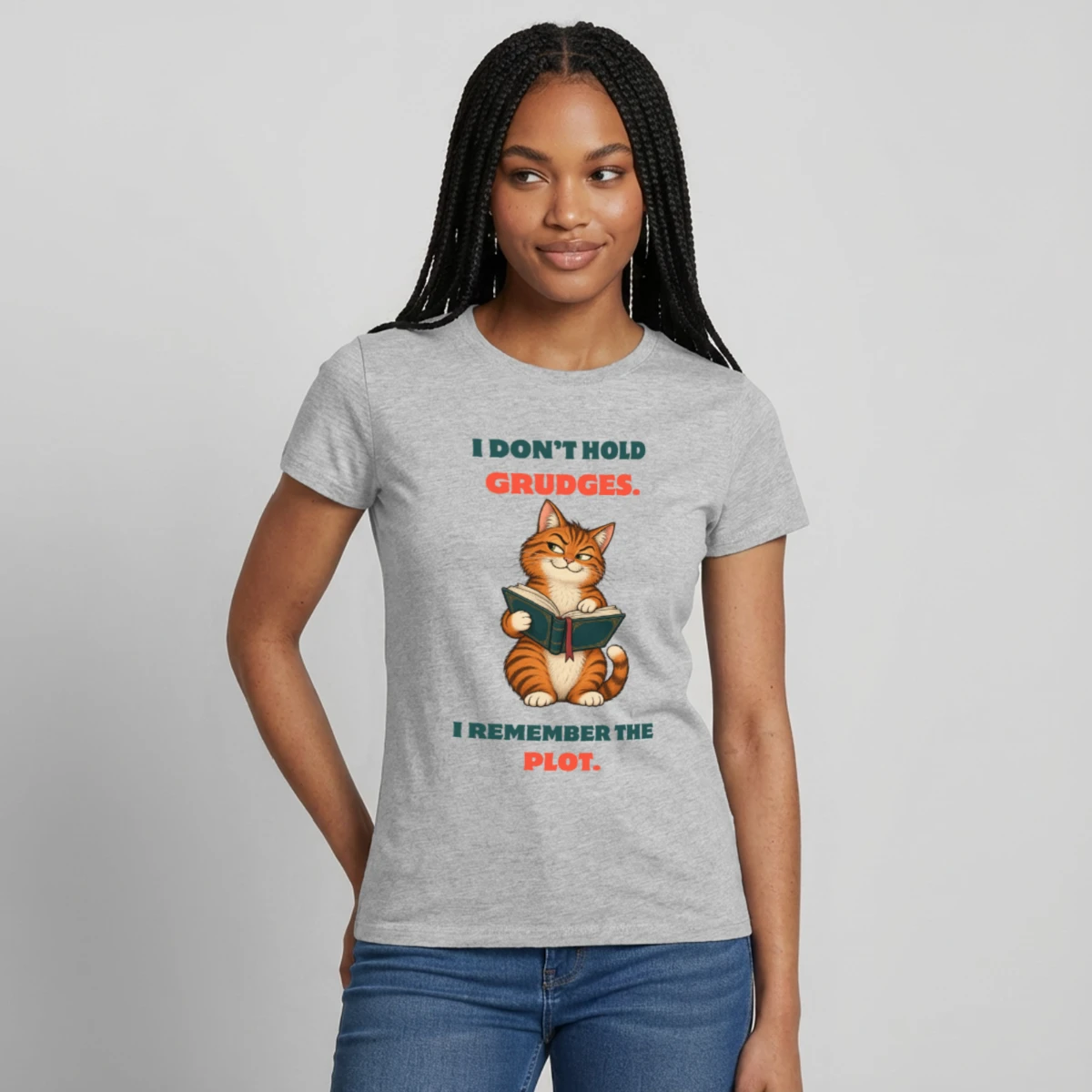 Women's T-Shirt featuring Cat Reads Book: Plot Instead of Grudges